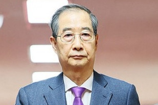 5月11日韩国前总理、当了7个小时国民力量党预备候选人的韩德洙表示如今自己将放下
