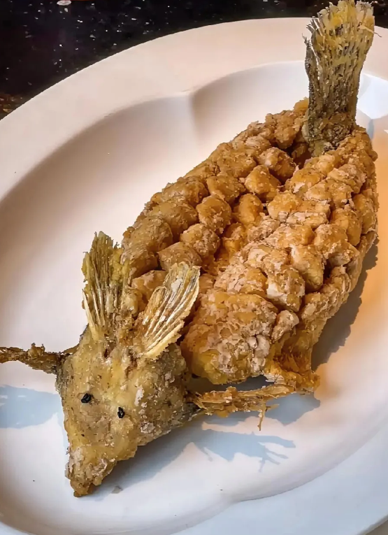 有没有谁告诉我，这个是哪里的美食？这道美食叫什么名字？