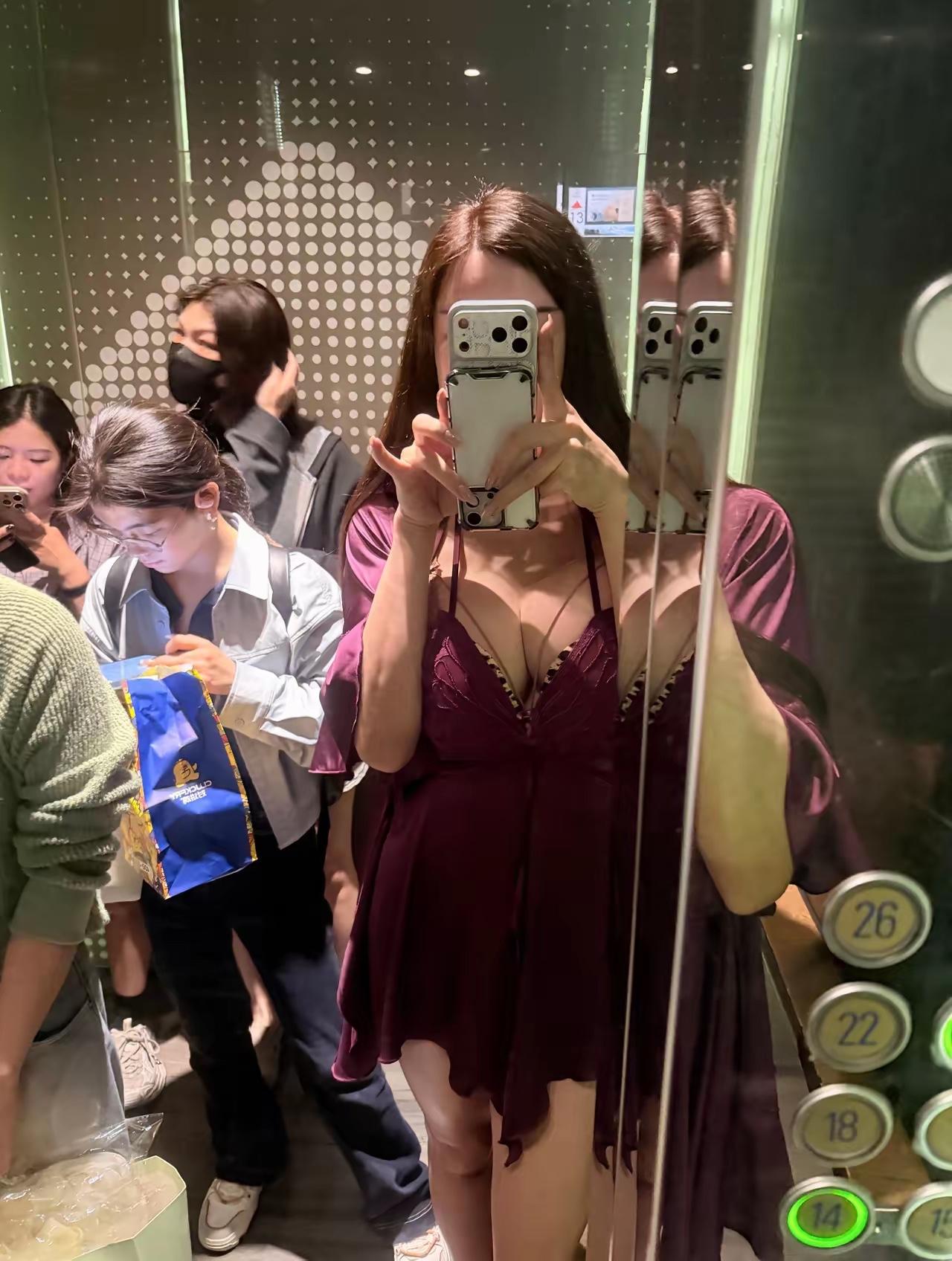 这位女士用的是什么品牌手机？