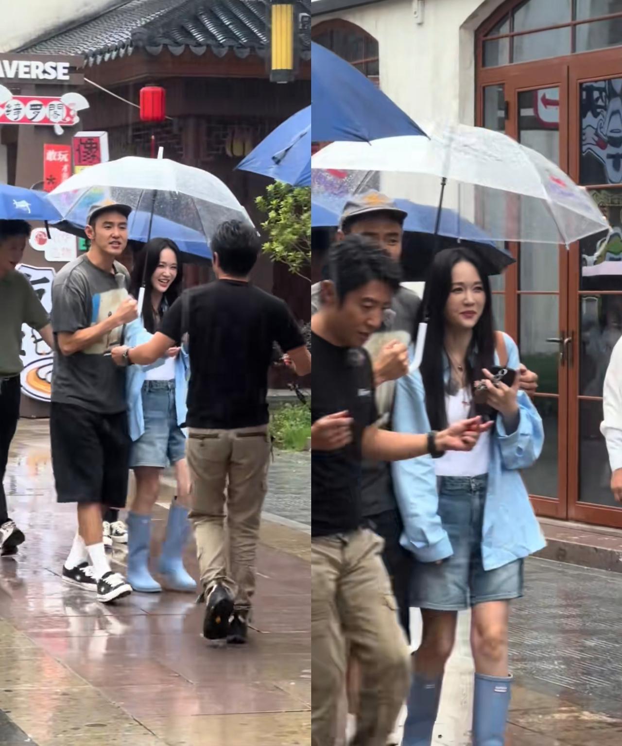 这松弛感跟真夫妻一样，纪存希为陈欣怡打伞，搭着她的肩膀，陈欣怡负责甜甜的笑容，这