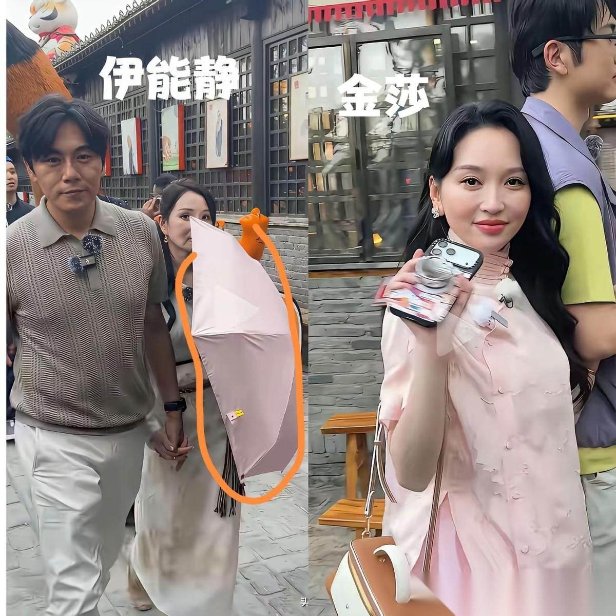 心老了！伊能静拿了一把太阳伞，可她没有把它高高举起，遮住太阳，而是把它变成了躲避