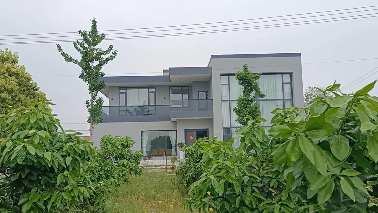 农村自建房你们是喜欢现代风格还是欧式风格了？这是我们村唯一的一栋