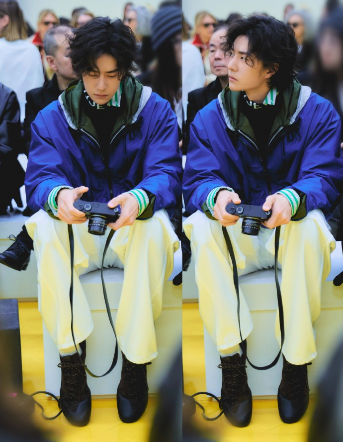 【王一博带相机看秀】王一博T台摄影师抓住一个认真看秀的，随身携带照相机，想知道拍