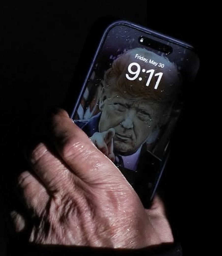川普用的iPhone锁屏壁纸是他自己的照片​​​