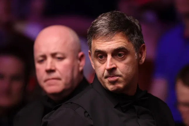 希金斯：奥沙利文用粉笔“干扰所有人”约翰·希金斯称罗尼·奥沙利文使用“残酷”策