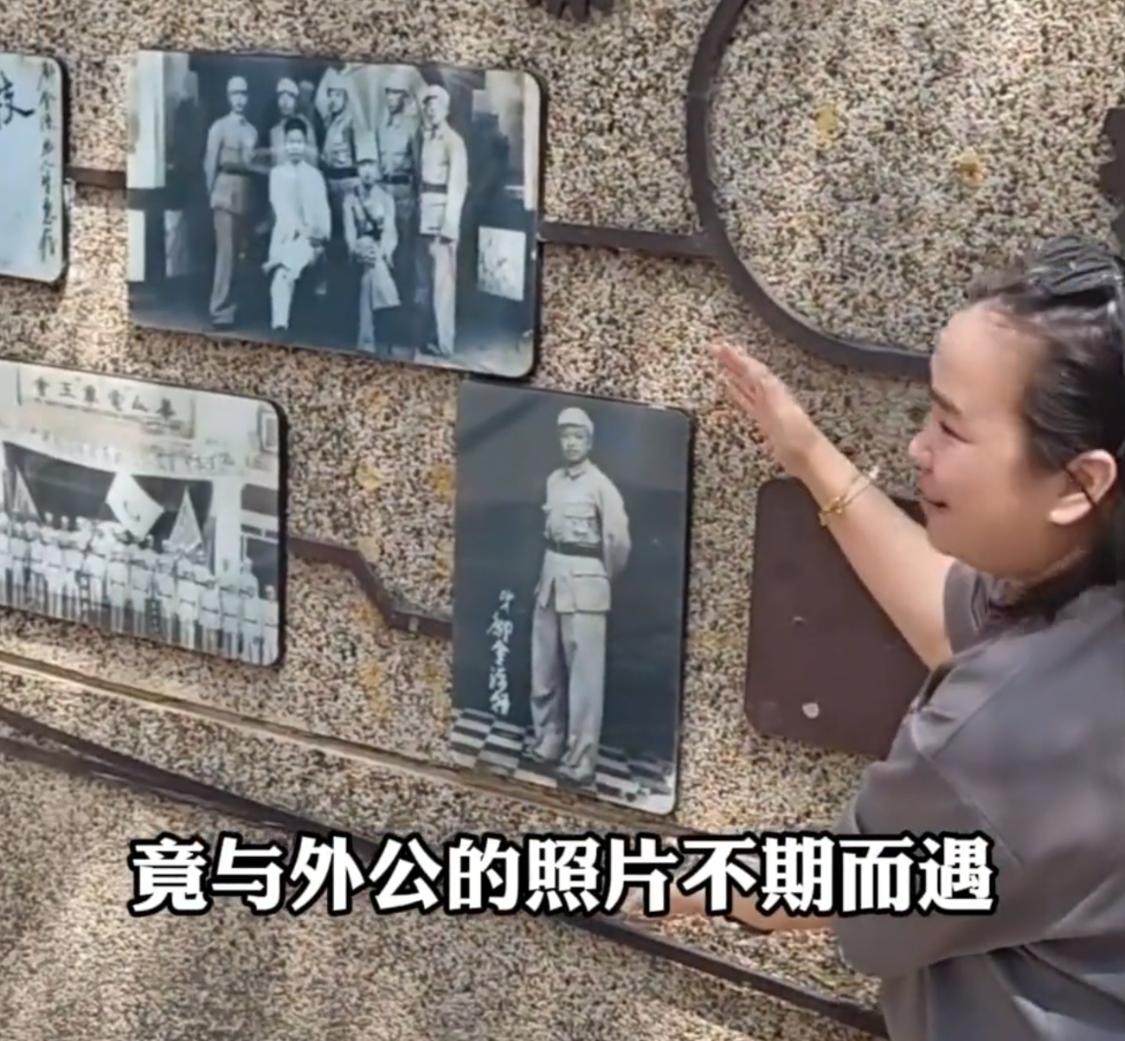 马来西亚女孩张慧清第一次到昆明旅游，闲逛到新闻南路时，被一面刻满老照片的墙吸引了