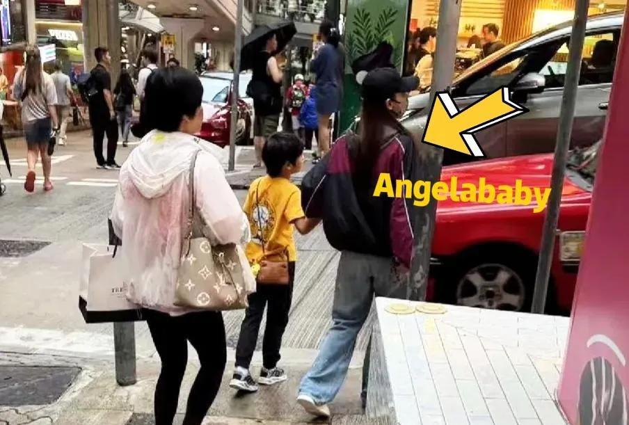 有网友在香港中环偶遇Angelababy和她儿子，母子俩在逛街！虽然她现在算是定