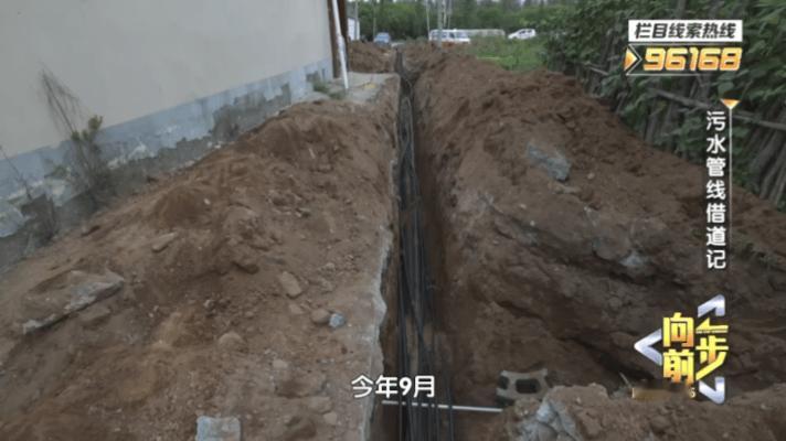 北京两村一管破解邻避之争北京房山尤家坟村，58户村民常年受污水之困：厕所靠手提