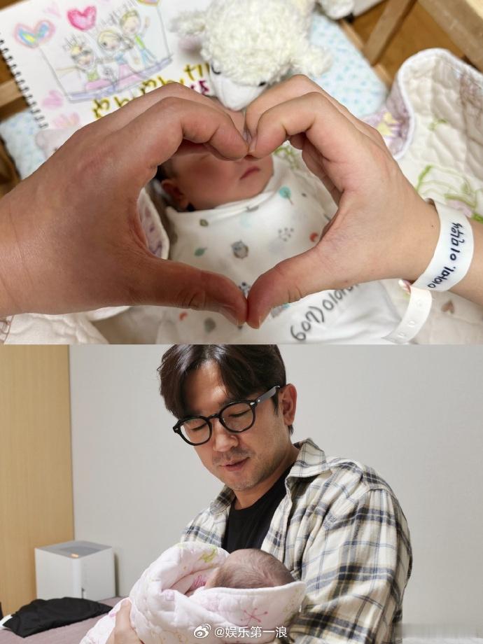 神话李玟雨抱娃照神话李玟雨晒女儿照片9日，神话组合李玟雨在妻子产女消息曝光后晒