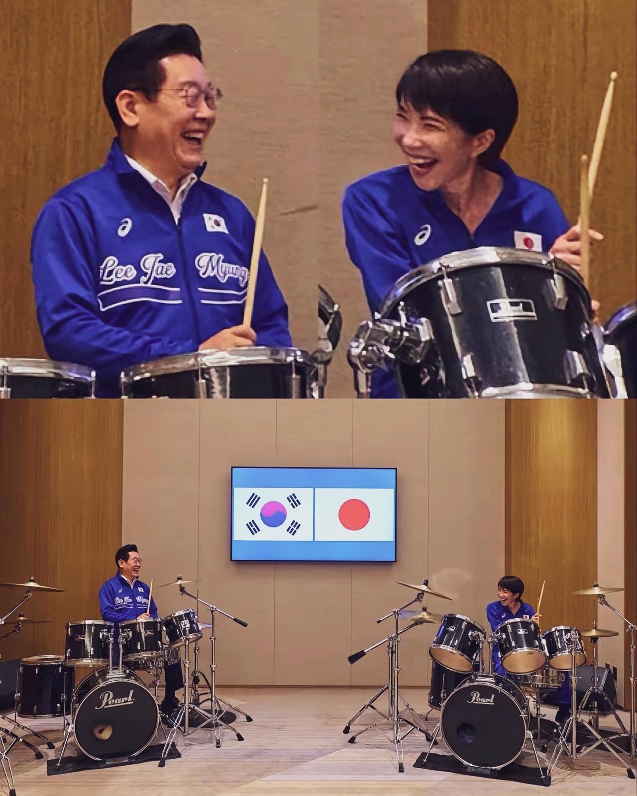 李在明与高市早苗敲架子鼓，看能不能敲到一块儿…李在明高日早苗