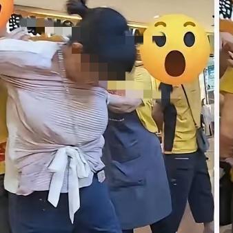 这下出名了吧全网都知道你偷菜了被几个人反剪胳膊，这个大妈估计丢脸丢的，以后都