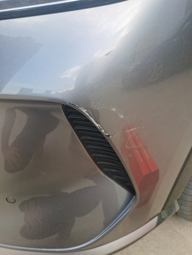 提点意见我这个该怎么修中午出去的时候，停在路边的停车位，去办事回来就发现被别人