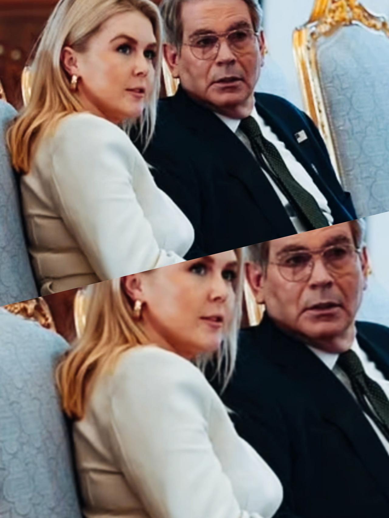 卡洛琳和贝森特两人看向同一个方向，在目不转睛看什么呢？什么事情让他们看的这么聚