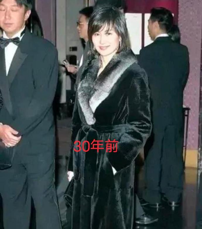 豪门有真爱，陈百强送给何超琼的大衣，她一穿穿了30年……