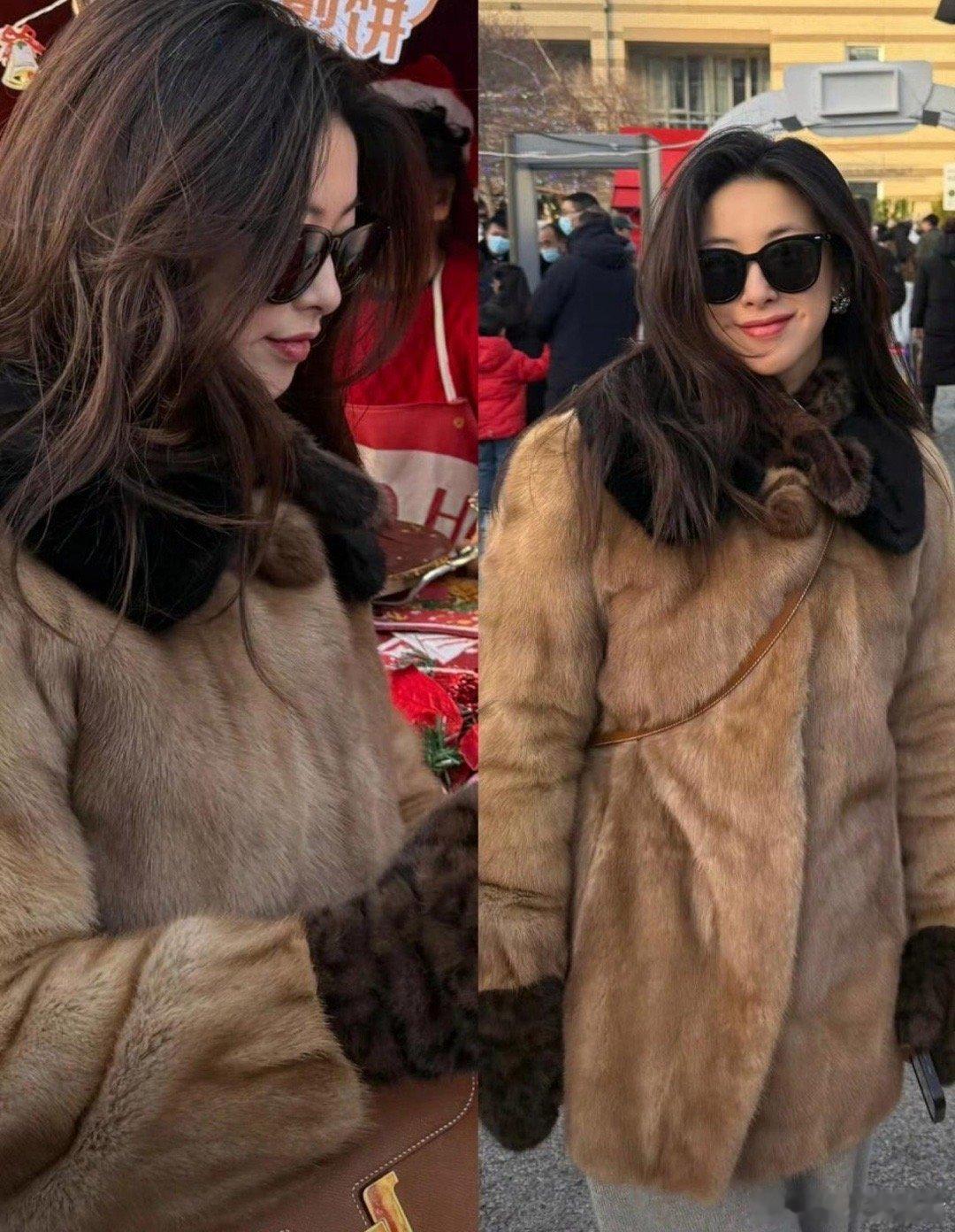 朱珠面无表情把老公挤开朱珠穿貂皮大衣和老公孩子外出游玩。在拍照环节，姐姐手臂将