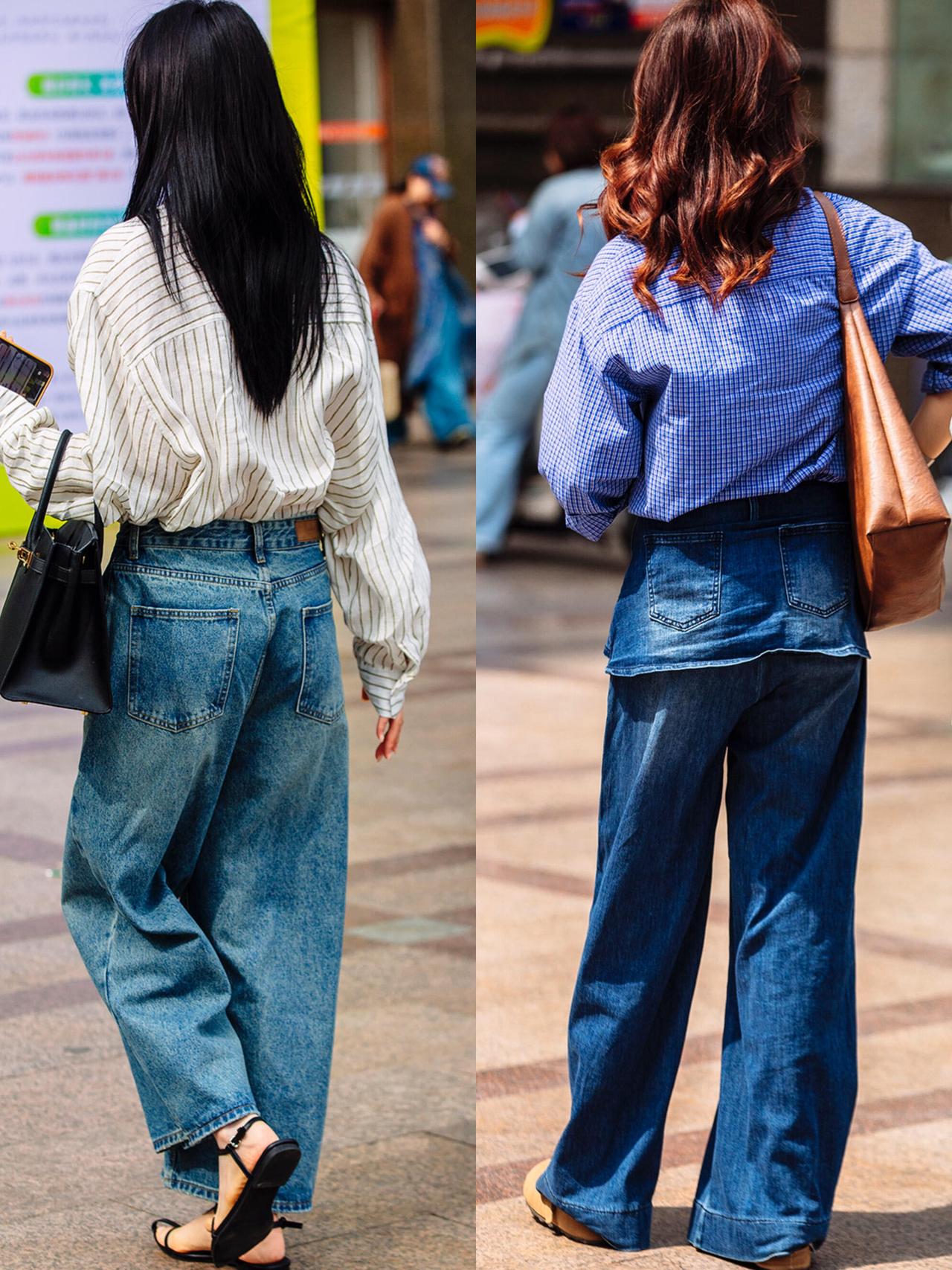 天气渐暖，时髦精们是怎么穿的？她们用宽松牛仔裤搭配条纹衬衫，随性又利落；卡其工