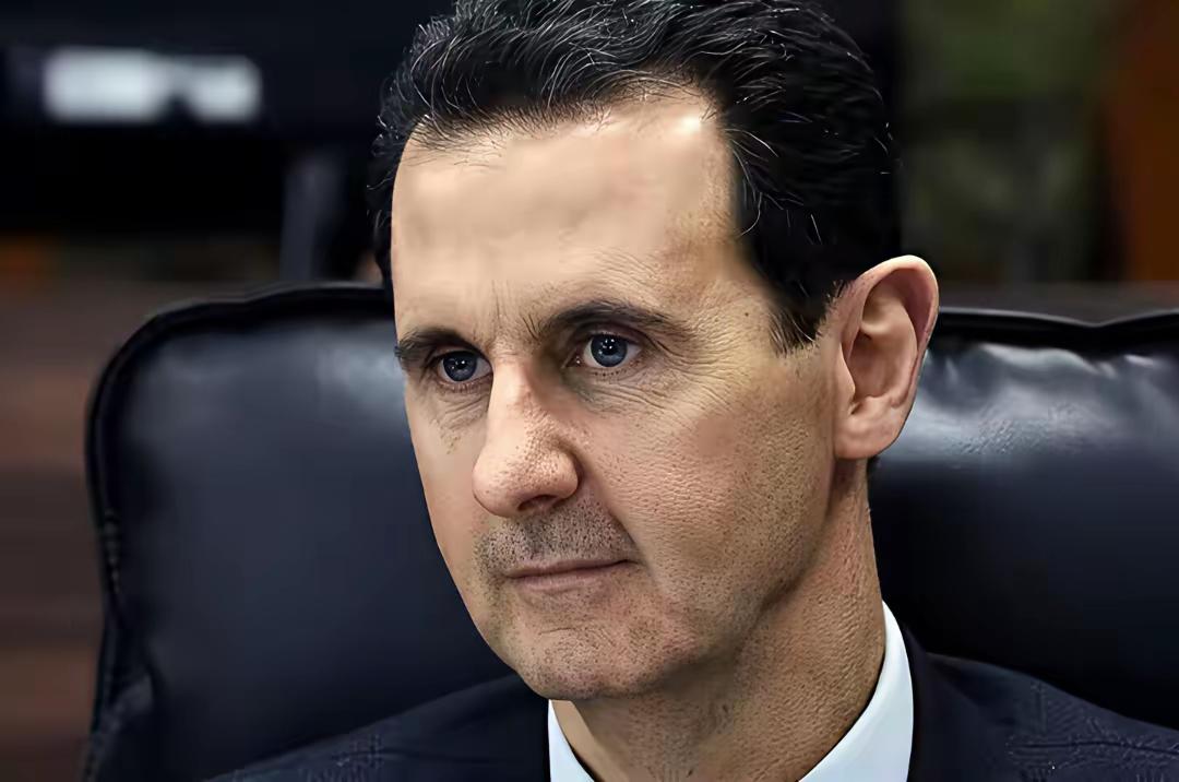 巴沙尔怎么这么老？平常看他相片挺年轻的，怎么这张相片显这么老？原来巴沙尔跟沙特