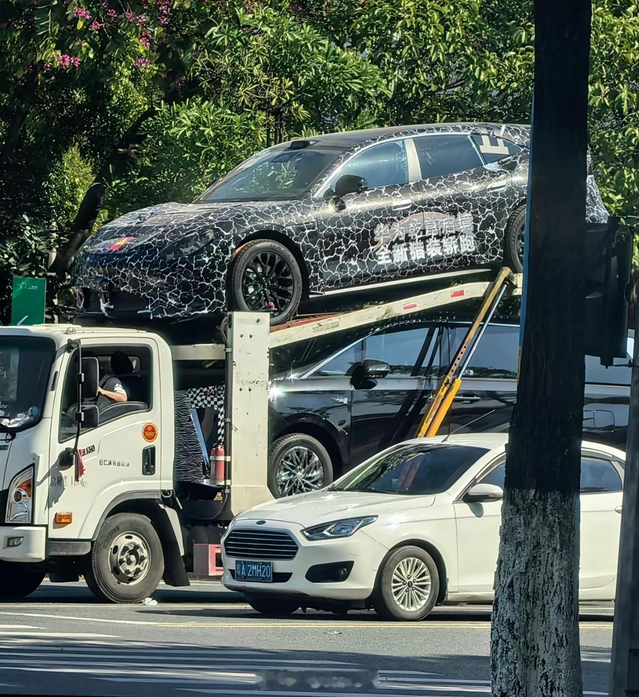 最近启境的猎装轿跑，伪装照陆续出现在网络上，车身比例和极氪001的感觉有点像，这