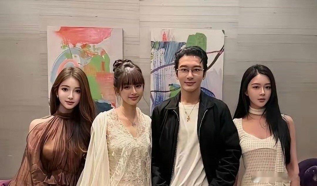48岁黄晓明与26岁女友胡冉儿同游新加坡环球影城，引发关注。胡冉儿身穿米白蕾丝长