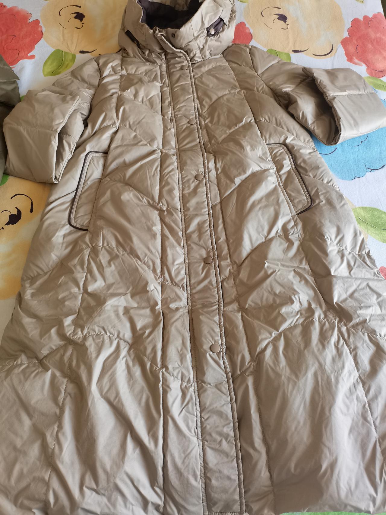 在并州路机关单位门过去，有一个专卖店，无意走进去，见卖一件羽绒服，300元一件，