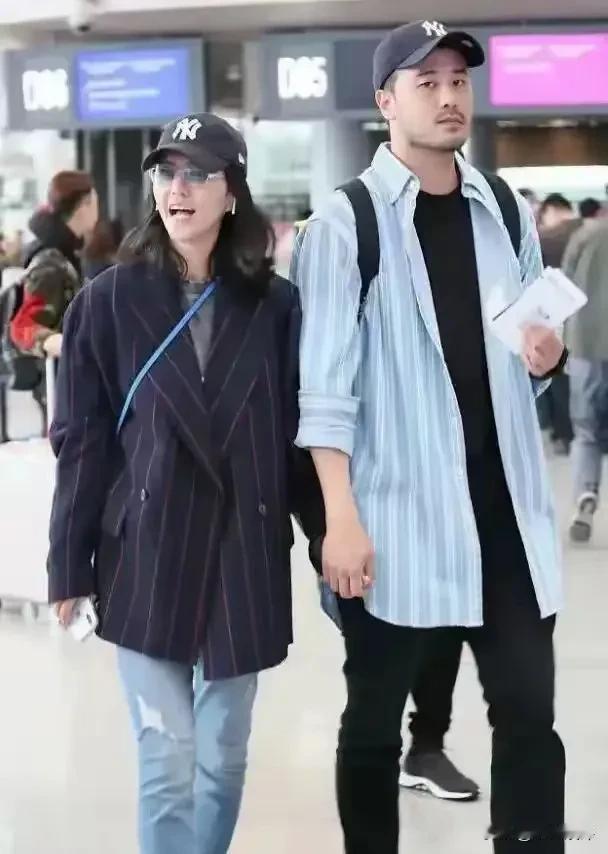 女歌手谭维维和她的老公。谭维维的老公是演员兼音乐制作人陈亦飞（原名陈宇凡），他1