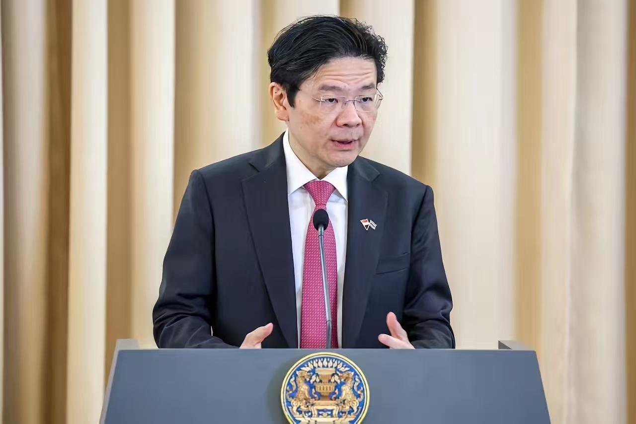 新加坡总理黄循财在接受华尔街日报采访的时候，居然对中国内政妄加评论！ 说白了