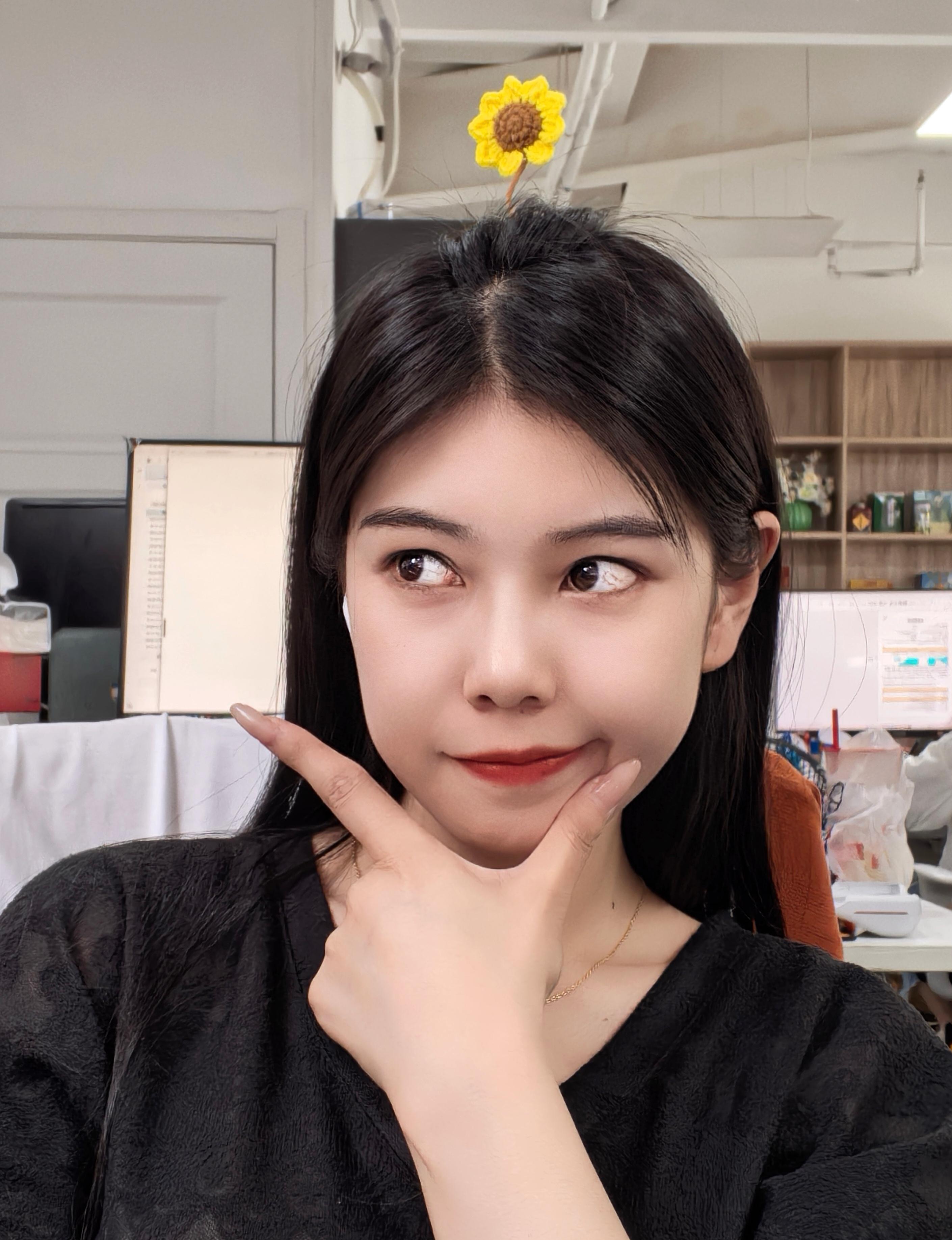 同事说我头上的向日葵🌻好搞笑