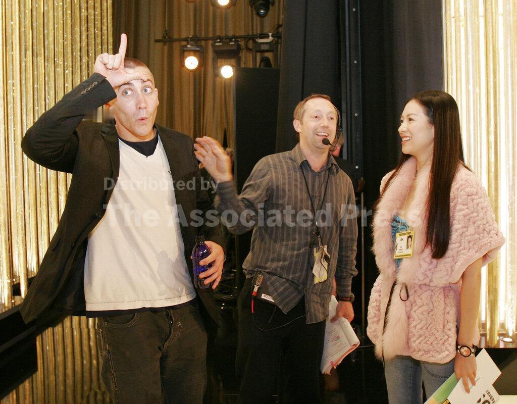 2005年奥斯卡章子怡和杰克·吉伦哈尔颁发最佳视觉效果奖的彩排照片，最后获奖的是