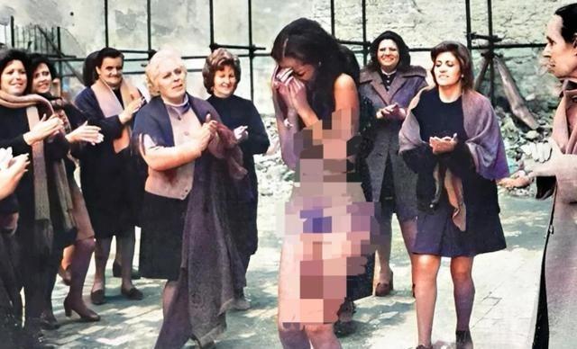 1945年，法国巴黎，这位名叫伊娃的女人，衣服被人扒了下来，丰腴的身体没有任何遮