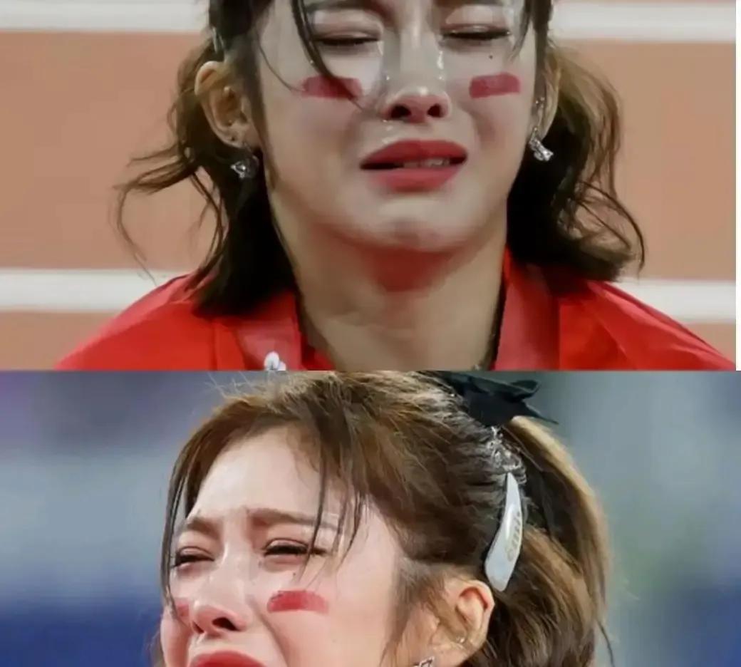 吴艳妮冲线那一刻直接蹲地上哭，镜头拉近能看到她肩膀一抖一抖。15秒，听起来就眨