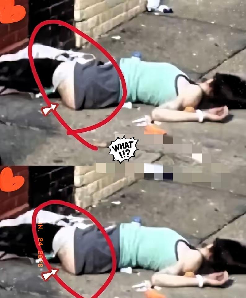 这张美国街头的抓拍，看得人脊背发凉。女孩倒在路边，裤子褪至大腿，毫无尊严地瘫软