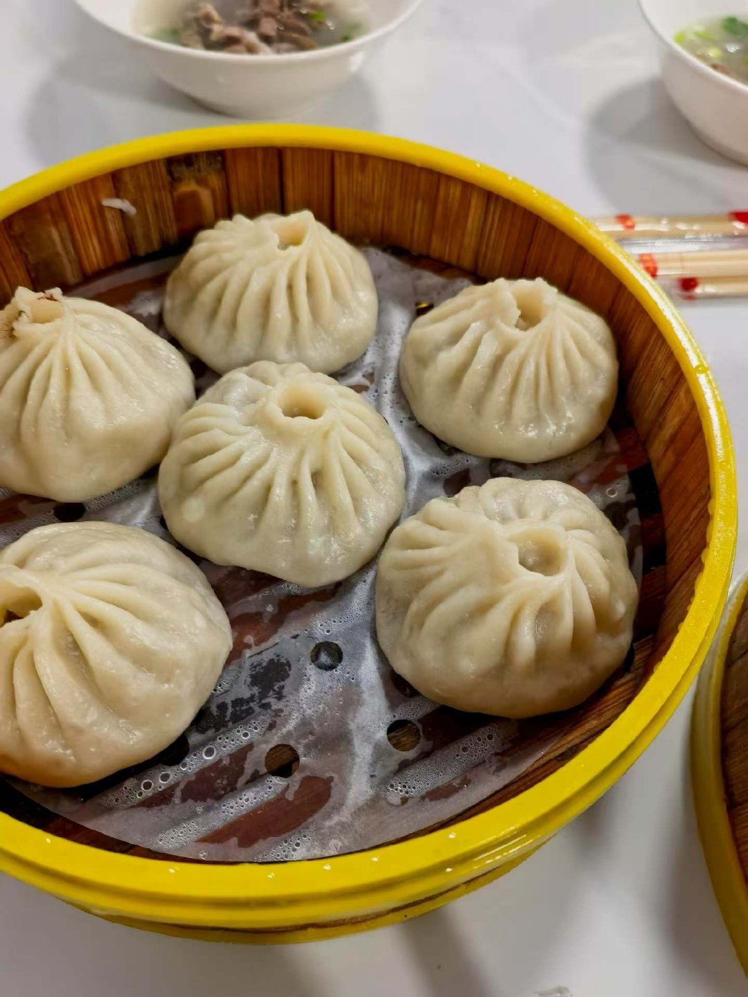真的要连续下这么多天雨么吃几个包子压压惊