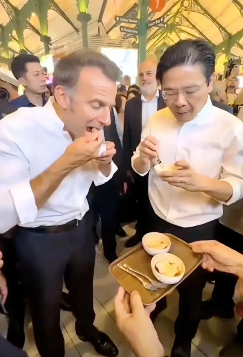 马克龙访东南亚三国，还是在新加坡最有面子！总理黄循财亲自带领马克龙夫妇逛夜市