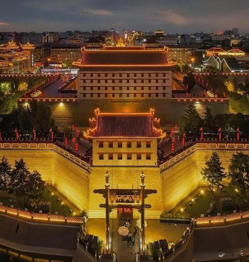西安街头一句标语火了，秋装刚收羽绒服就上身，这天气到底怎么了？那天西安科技西