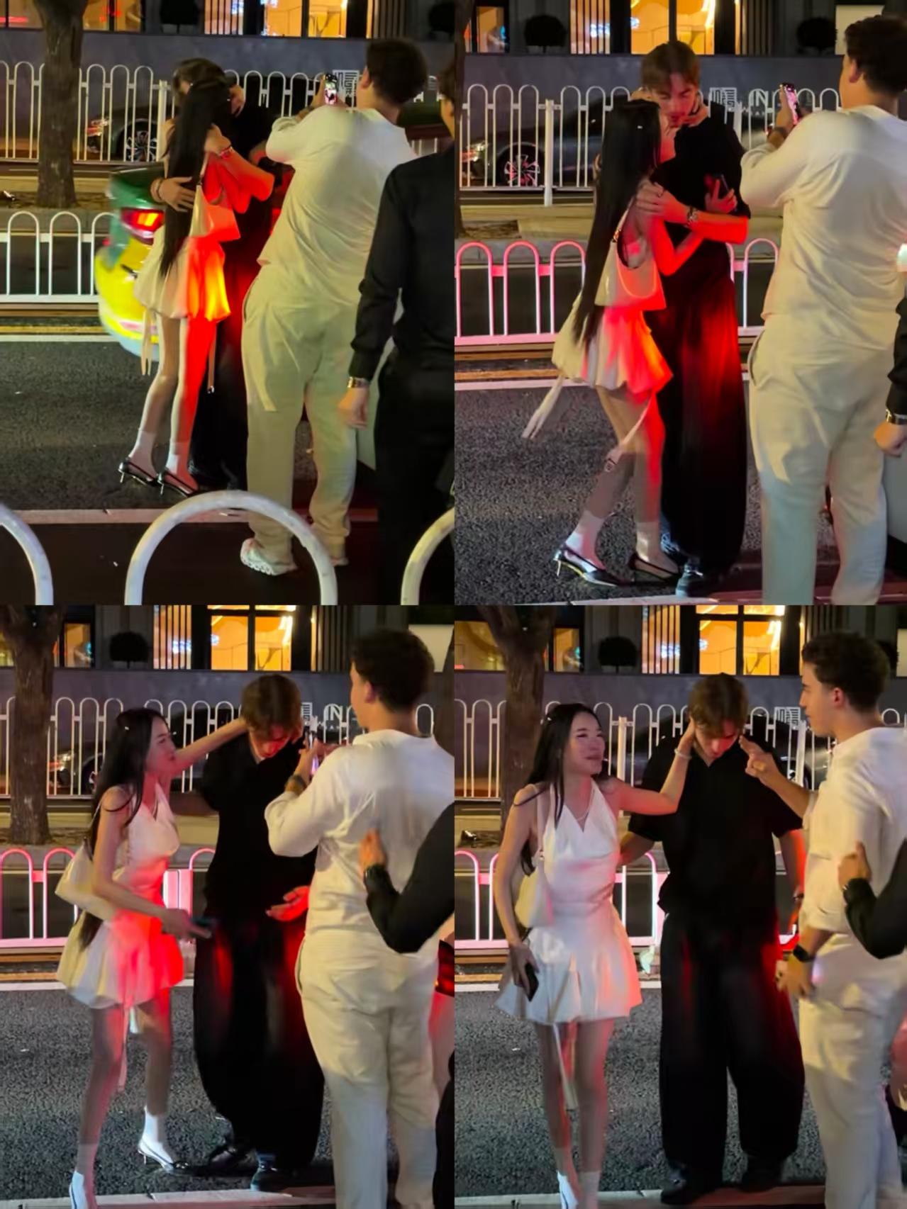 女生深夜与外国男子在街头激吻，他的朋友在一旁拿着手机拍摄。这段视频大概率会被他们