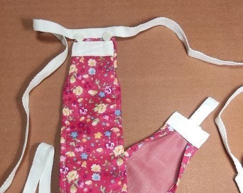 1988年，在江西出土的一具女尸，当褪下她的衣服时，发现女尸的下体有一团肉块，还