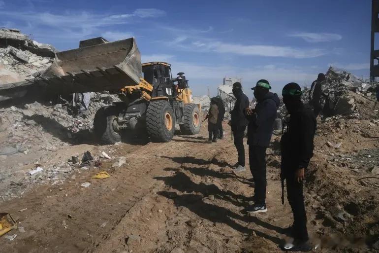 图集：哈马斯和伊斯兰圣战组织成员在加沙北部搜寻俘虏遗骸图1伊斯兰圣战组织和哈马