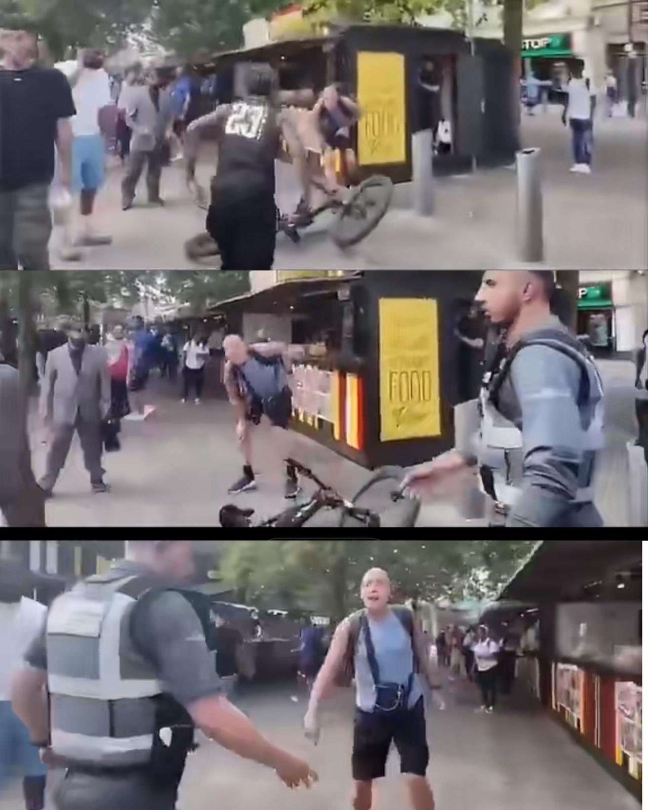 骑着自行车英国老头被黑人移民故意踹倒，旁边的英国帽子没有去抓人，反而让那个移民溜