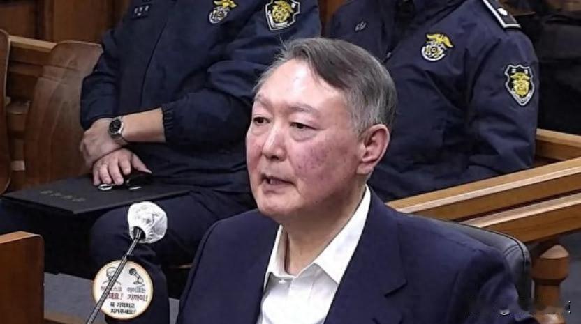 直播全程公开，前总统戴手铐坐被告席，判决到底算谁赢？2026年2月19日下午三