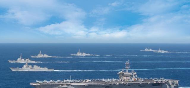 美国人敢放话说“拦截就是宣战”，那中国就该把话挑明了：“谁敢把武器运进台湾，谁就