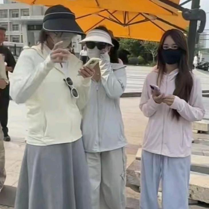 实在看不懂，到底是怕热还是怕冷？三十多度高温走在街上，发现一个有意思的现象