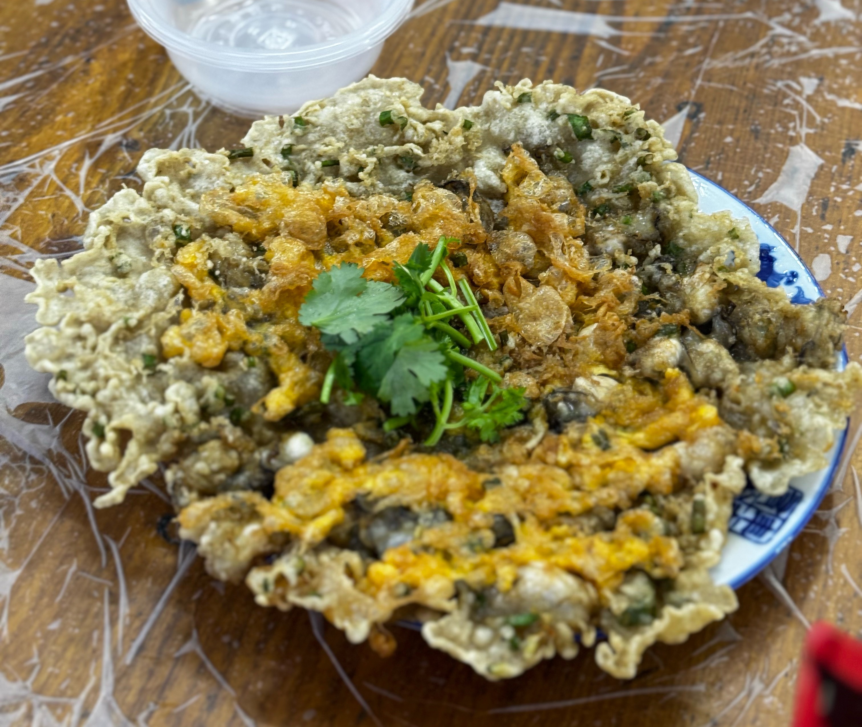 这蚝烙不错，比我在其他地方吃的都好吃，就是有点贵，这一盘要68[笑着哭]​​​