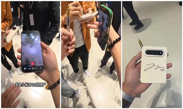 笑不活了，别人去小米汽车交付现场提车，这位博主跑去现场追星雷军！直接把刚到手的小