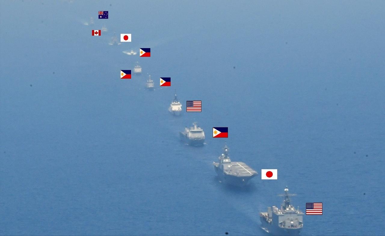 日本自卫队发布了“肩并肩”军事演习的现场照片，非常心机的将参演舰艇的国旗标注上来