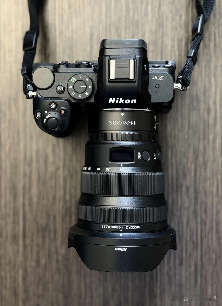 心心念念的相机终于到手了，但是有人却不理解，还说我就拍个照而已手机能解决为什么花