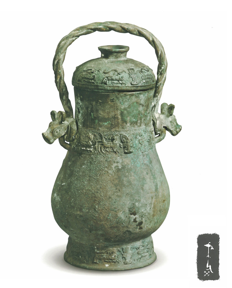 陕西泾阳县博物馆藏1991年泾阳高家堡M3出土西周早期:戈父癸壶.绳索状提梁两