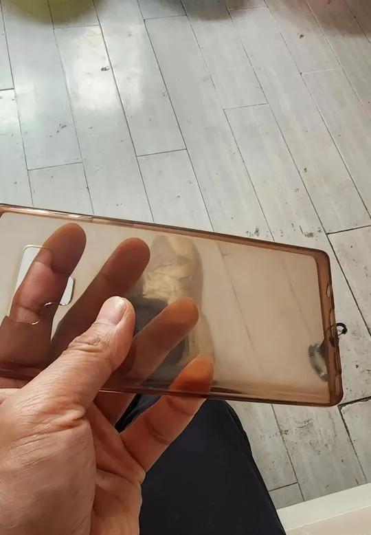 当年那些铁疙瘩充电器是真抗造！昨儿收拾仓库翻出个上古神器，嚯！这分量差点没给我手