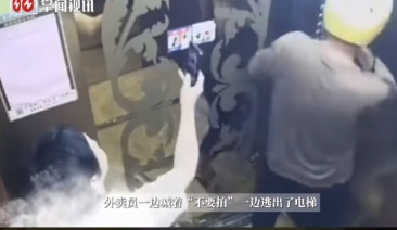 “离了个大谱！”6月9日，浙江温州，一位带着外卖头盔的男子在乘坐电梯时，突然憋不