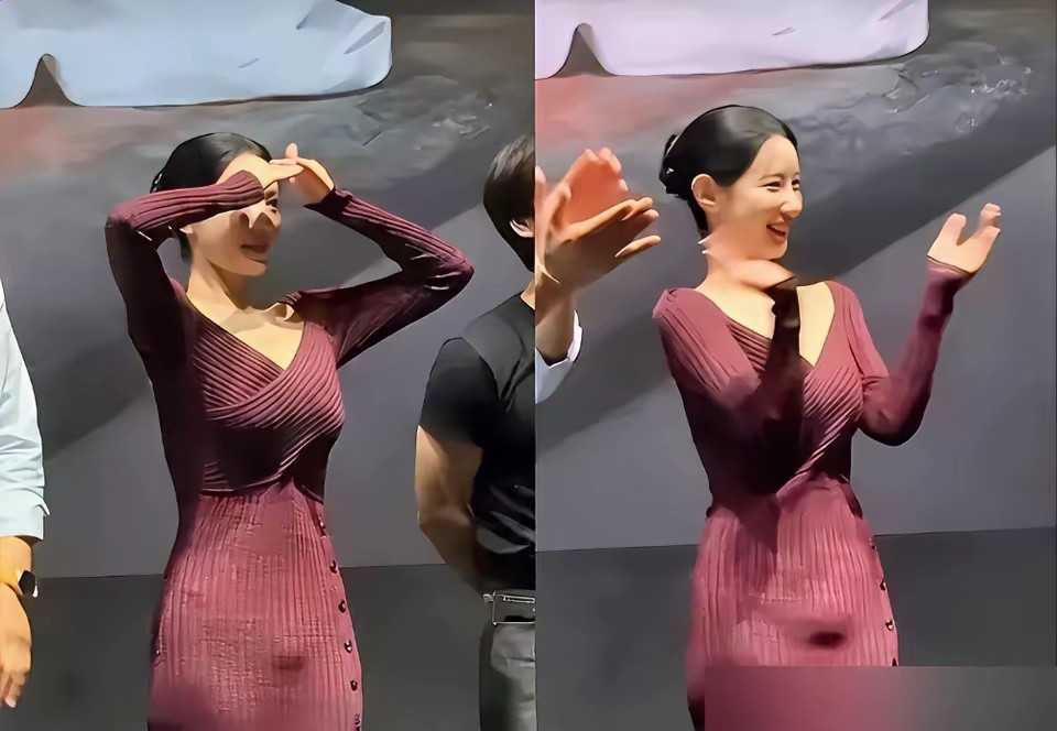 一条裙子，毁了整场首映礼。酒红色针织裙，紧，薄。强光一打，小腹轮廓全出来了。镜头