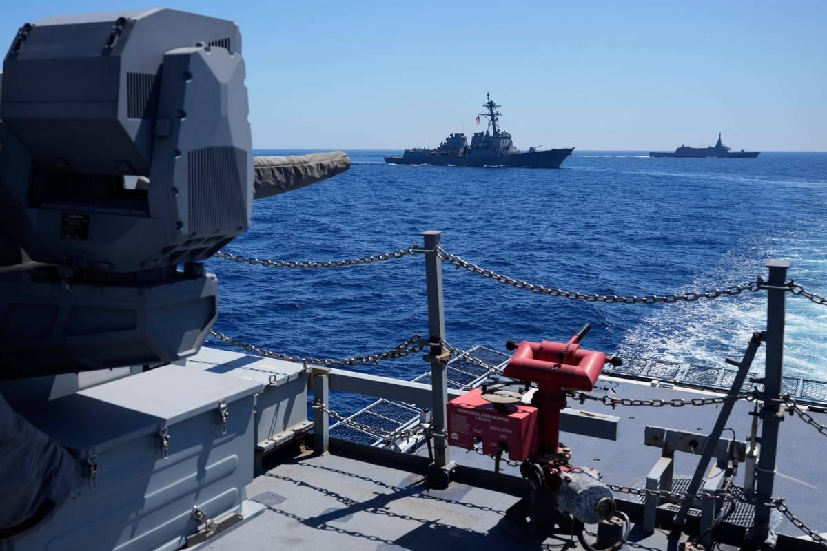 南海又动工，渔船变“围墙”，这套组合拳背后，大有门道卫星图显示，中国在南海又